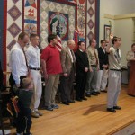 Daniel is flanked by all the Eagle Scouts present