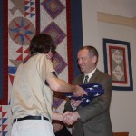 Dave Stepp with the flag from the State House
